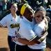 Michigan senior Ashley Lane (right) and freshman Sierra Lawrence celebrate defeating Louisiana-Lafayette on Friday, May 24. Daniel Brenner I AnnArbor.com